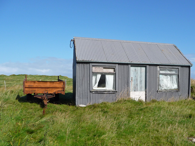 Hut with corrugated roof